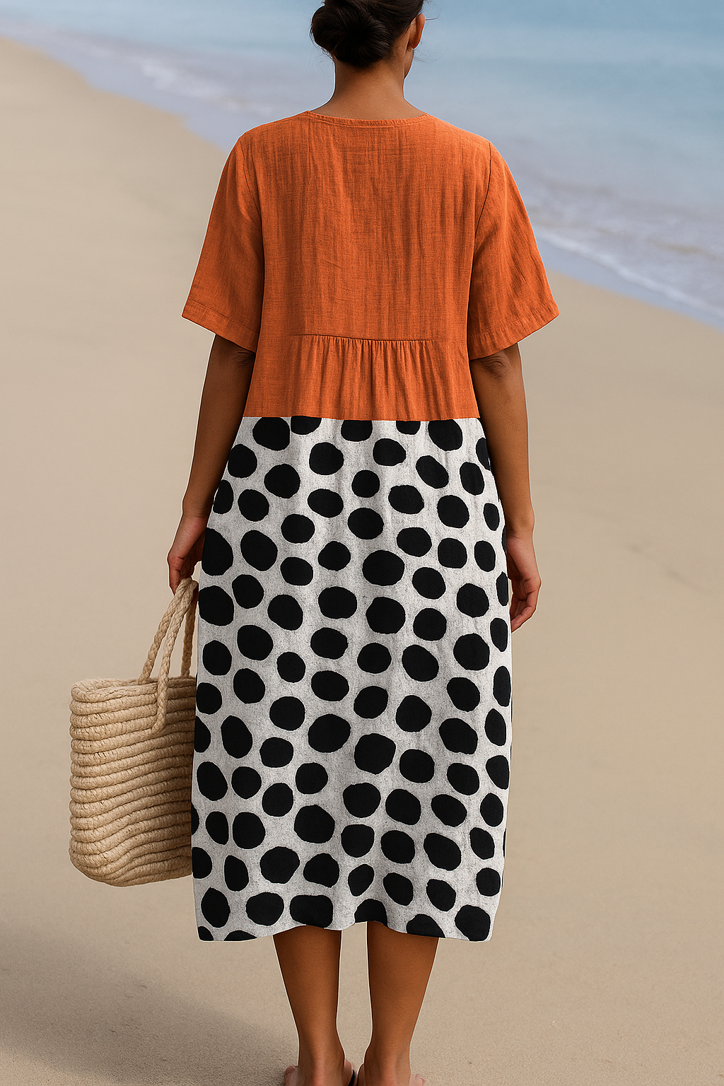 Maëlle | Vestido naranja con lunares contrastantes