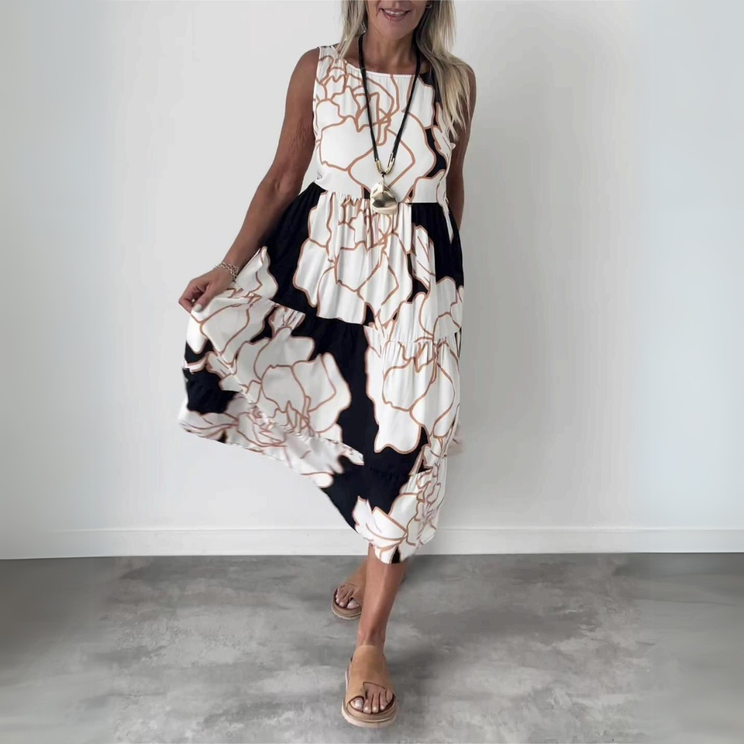 Natalija | Vestidos elegantes con flores y un silueta cómoda